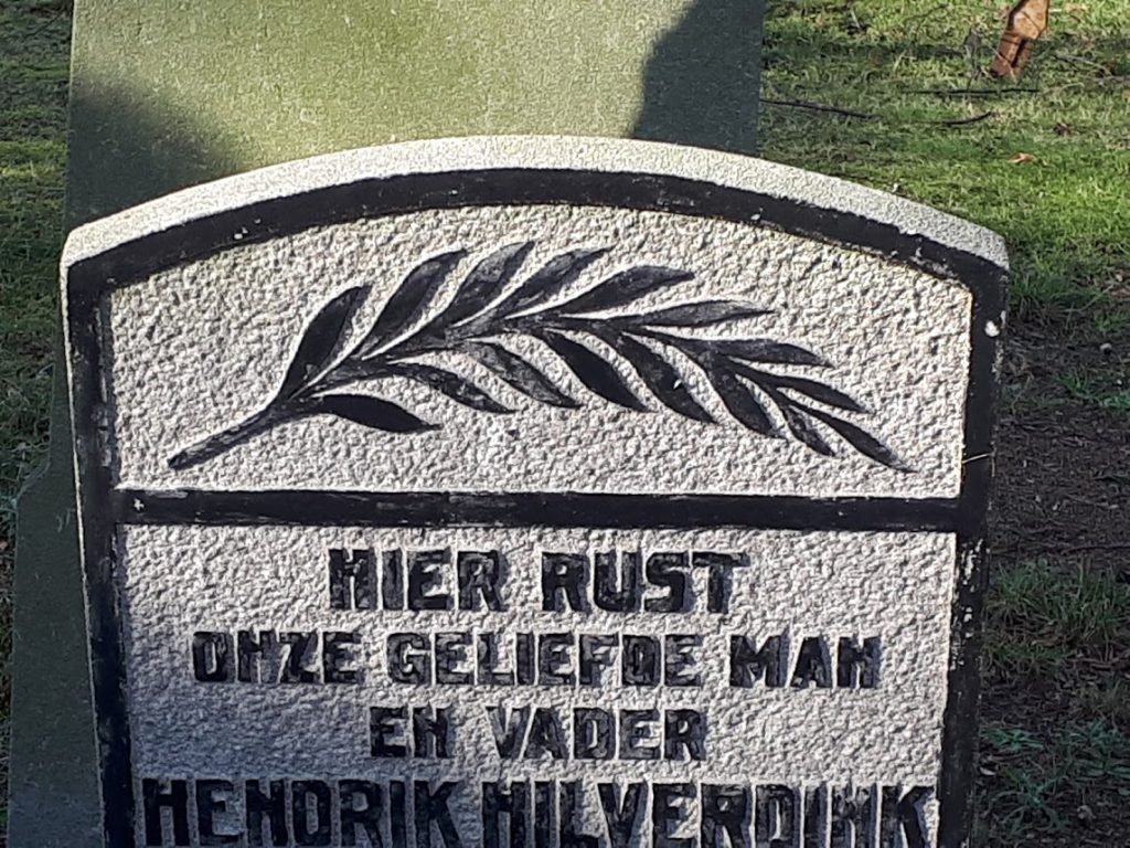 Grafsteen met palmtak